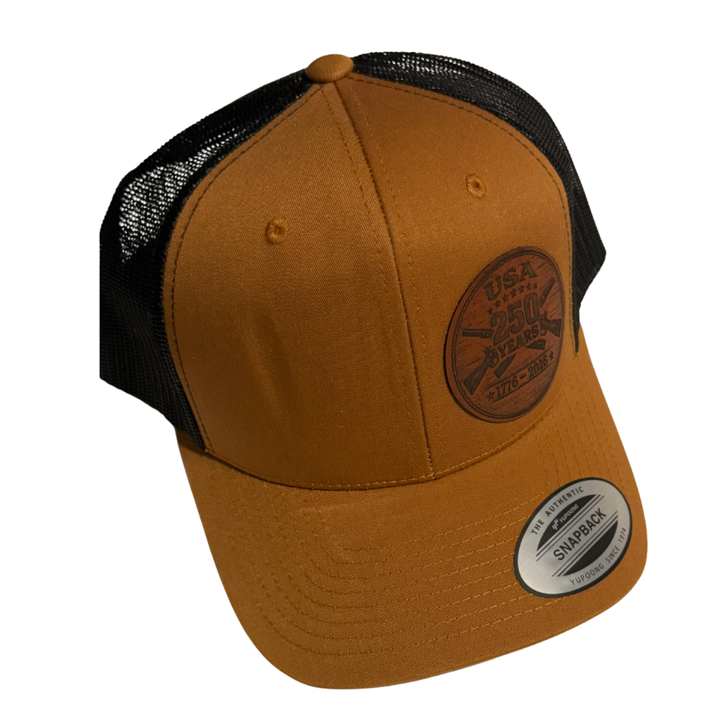USA 250 Years Leather Patch Trucker Hat – 1776–2026 Anniversary Edition (Tan/Black)