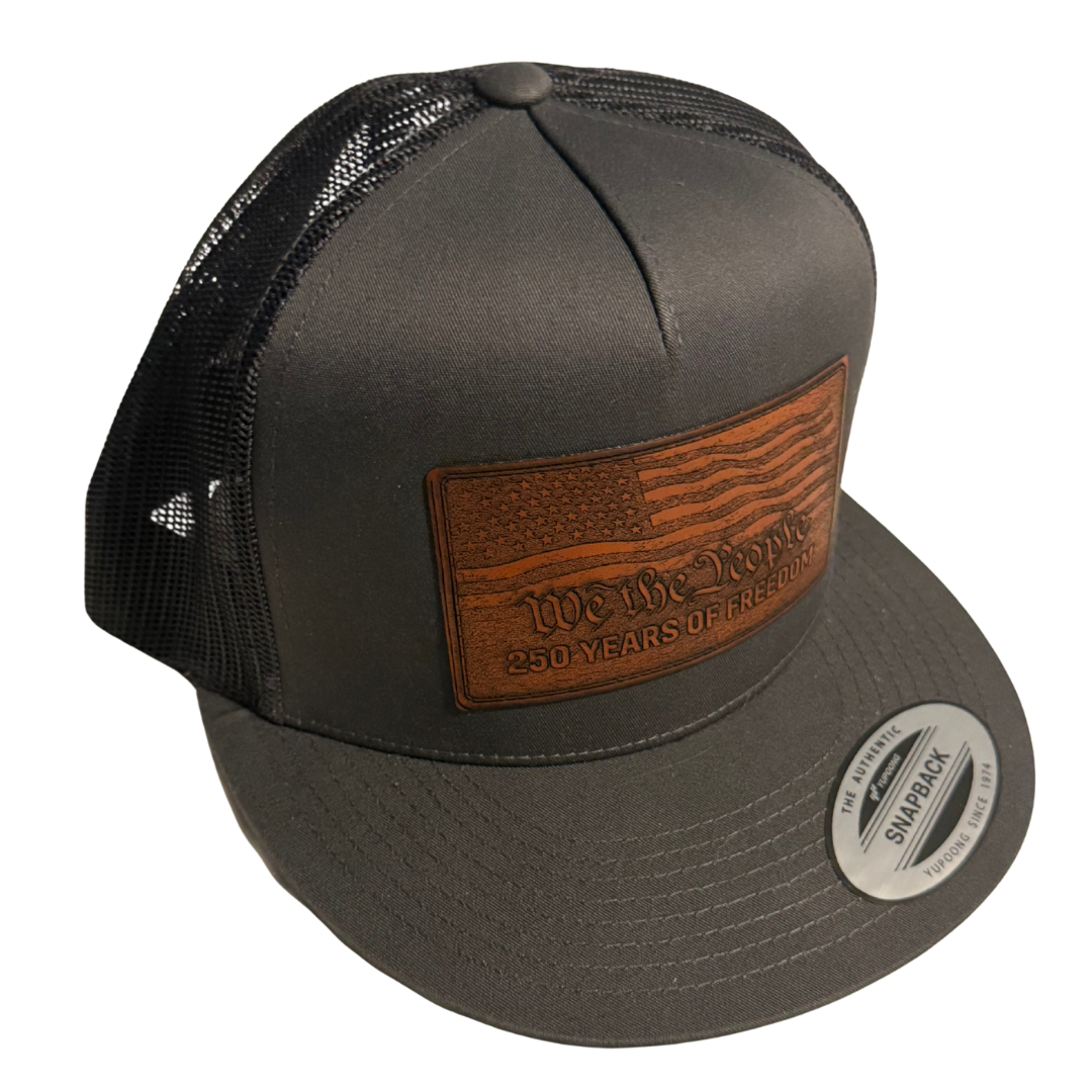 We The People 250 Years Leather Patch Trucker Hat – 250 Years of Freedom Edition